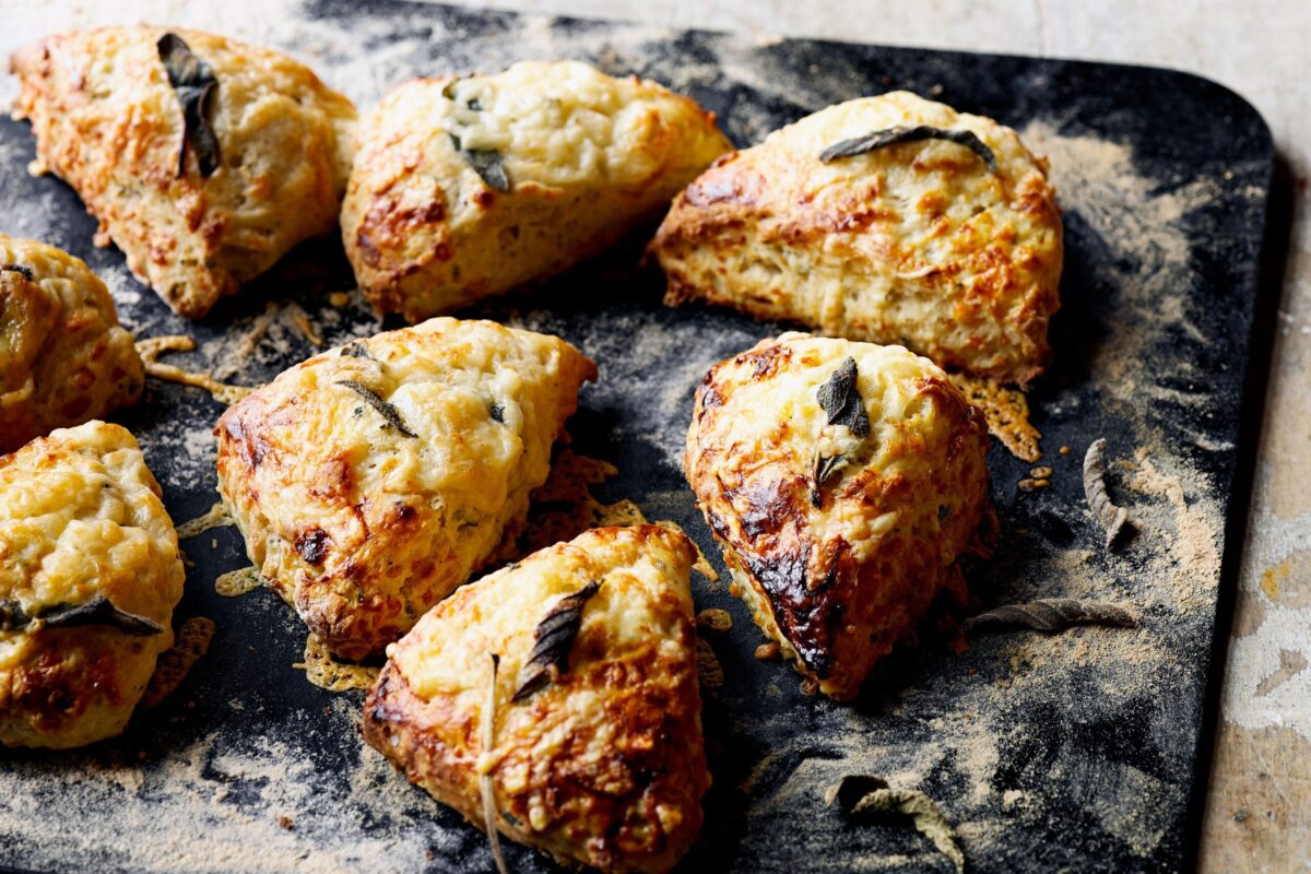 Fluffy scones with cheddar and visible flecks of sage.