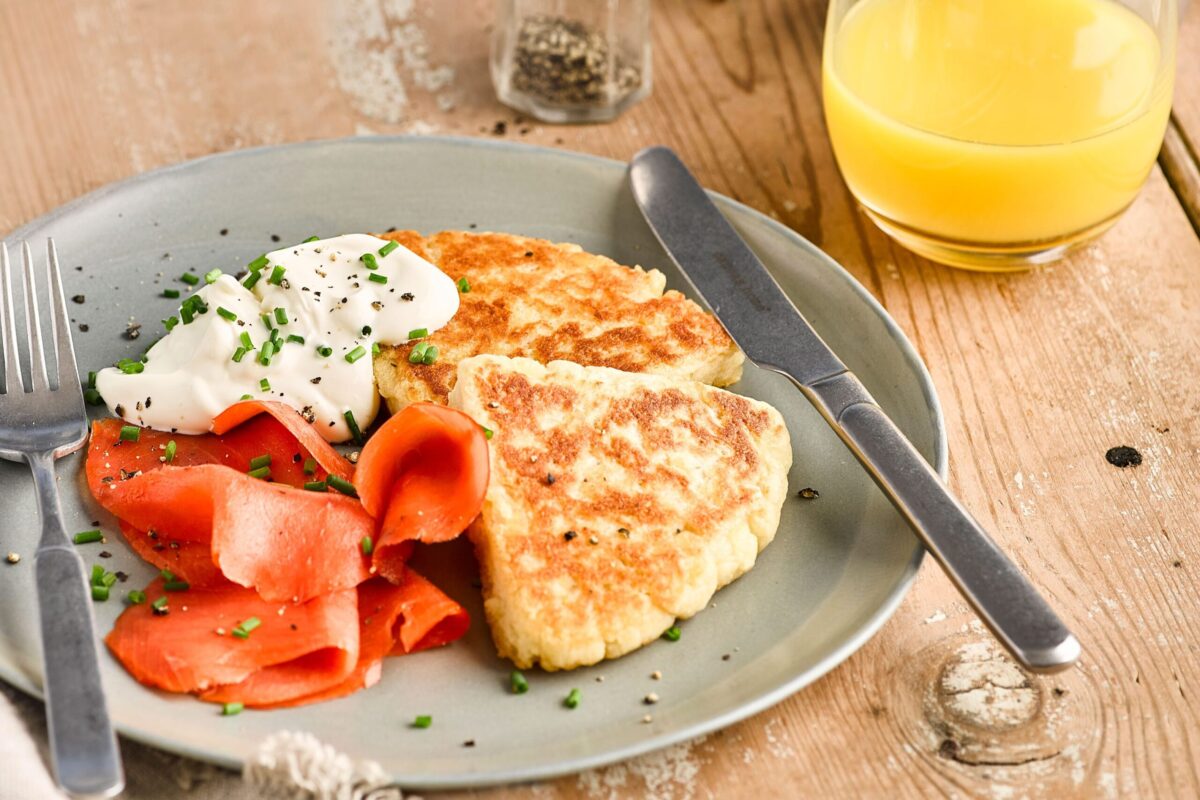 Potato scones topped with smoked salmon and a dollop of soured cream with dill.
