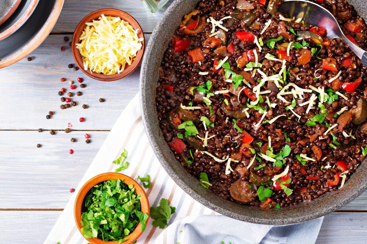 A delicious, steaming bowl of bean and vegetable casserole.