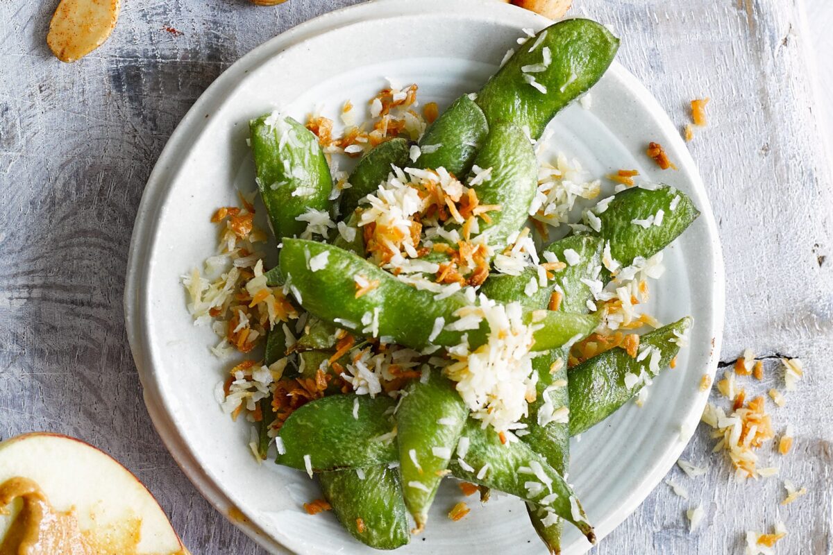 A bowl of coconut-roasted edamame beans.