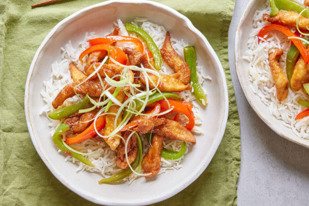 A bowl of crispy shredded chicken ready to be served.