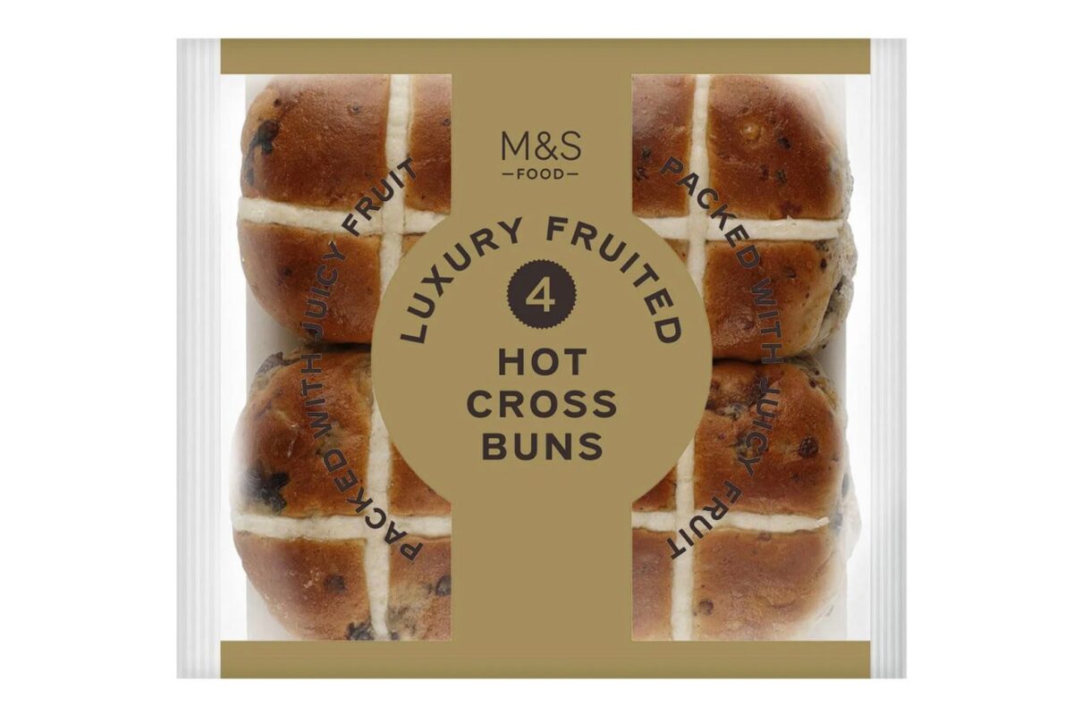 A close-up of delicious, fruity hot cross buns.
