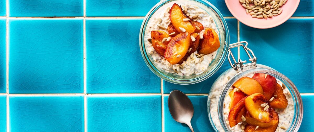 A close-up of overnight oats with chia and apricots, ready to eat.