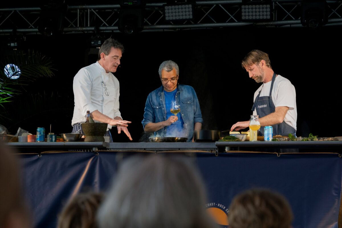 Chefs presenting on stage at the Porthleven Food Festival