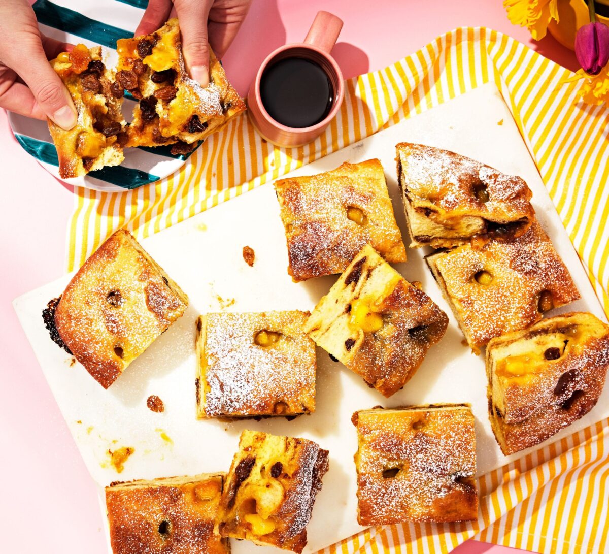 Squares of sweet Simnel focaccia with marzipan and fruit.
