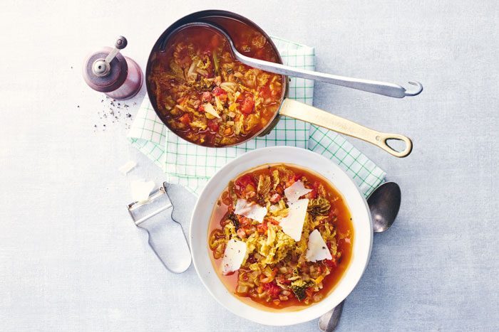 Two bowls of hearty cabbage soup ready to eat