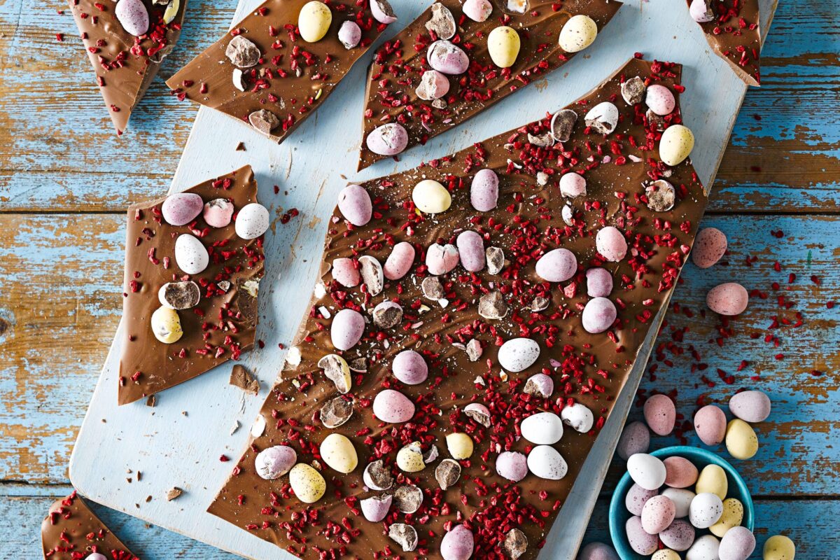 Colorful Easter chocolate bark with a shiny, tempered surface.