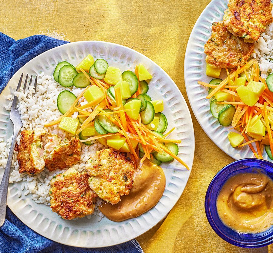 Several prawn and mango fishcakes ready to be served