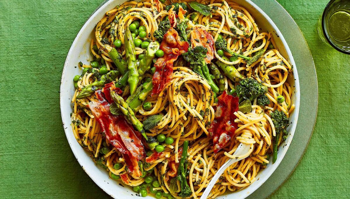 A bowl of spring greens carbonara pasta