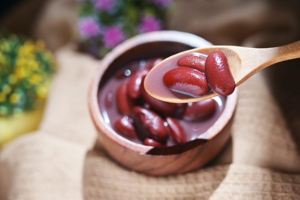 An open tin can of red kidney beans.